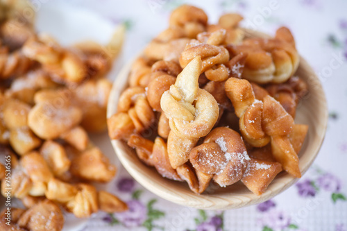 sweet pastry deep fried and sprinkled photo