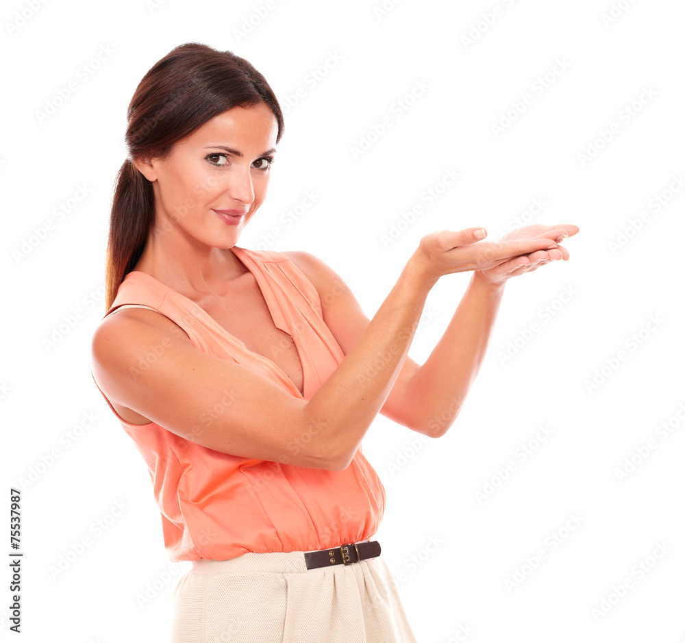 Friendly pretty woman holding palms up Friendly pretty woman holding palms up