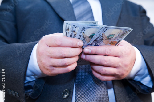 Businessman with money in hands