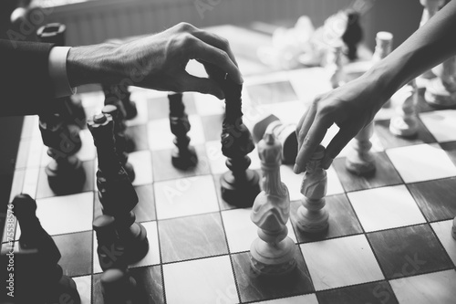 wedding couple playing chess