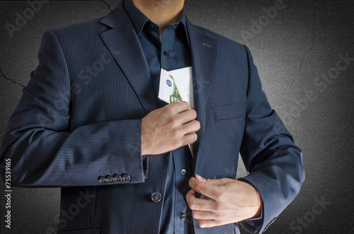 man has enveloped euro banknotes