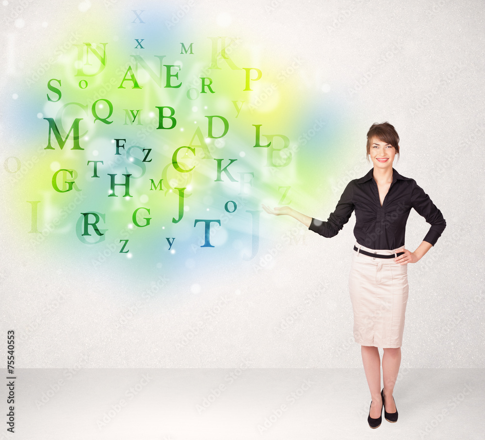 Business women with glowing letter concept Business women with glowing letter concept