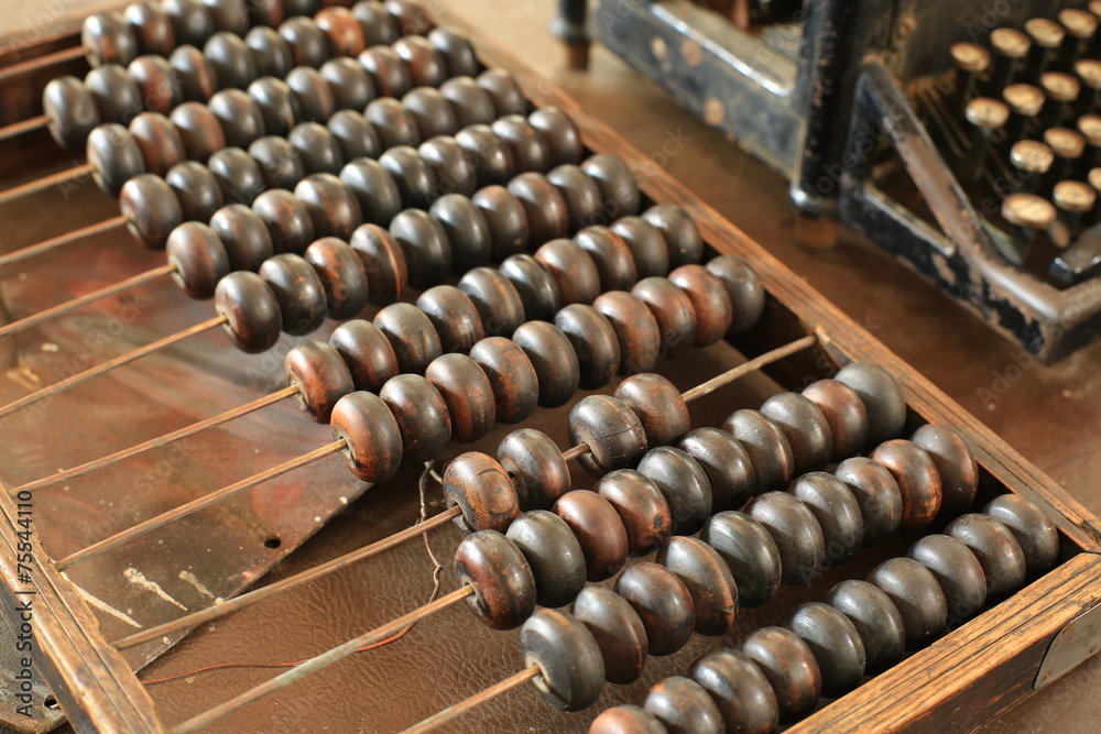 Old wooden retro abacus on the table Old wooden retro abacus on the table