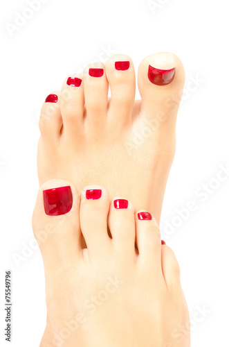 Beautiful female foot with red pedicure