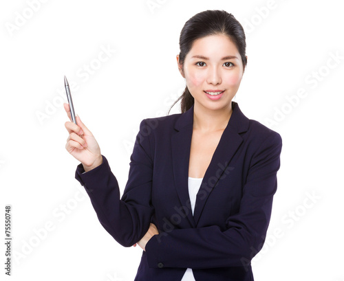 Businesswoman with pen point up