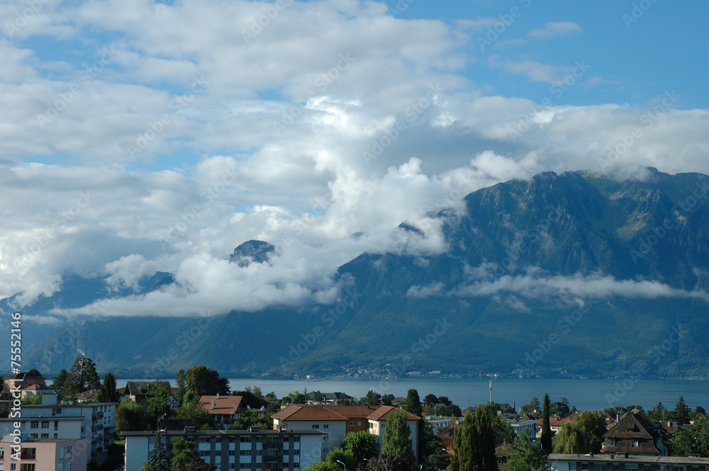 Mountains, lake and buildings in La Tour-de-Peilz in Switzerland