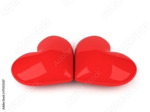 two red hearts on the white background © Ruslan Grumble