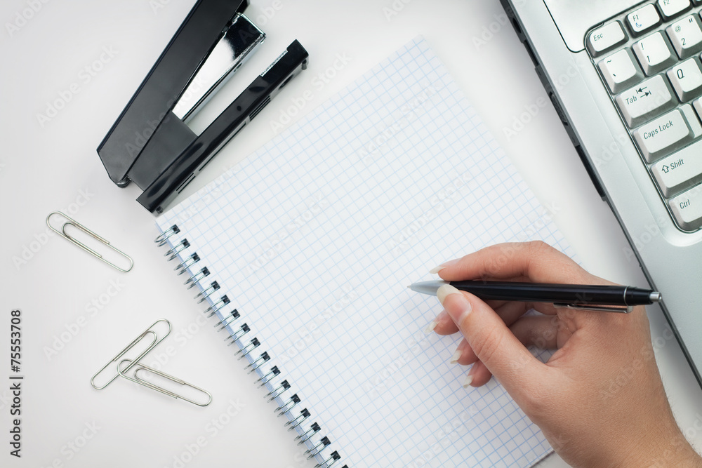 woman in the office ready to write woman in the office ready to write