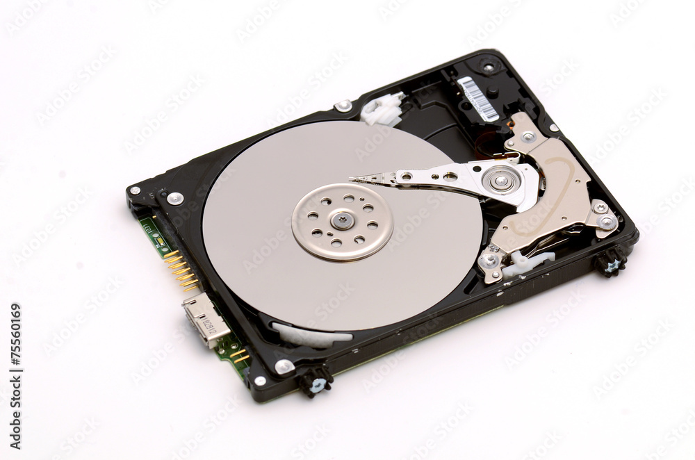 Disassembled HDD isolated on white background Disassembled HDD isolated on white background
