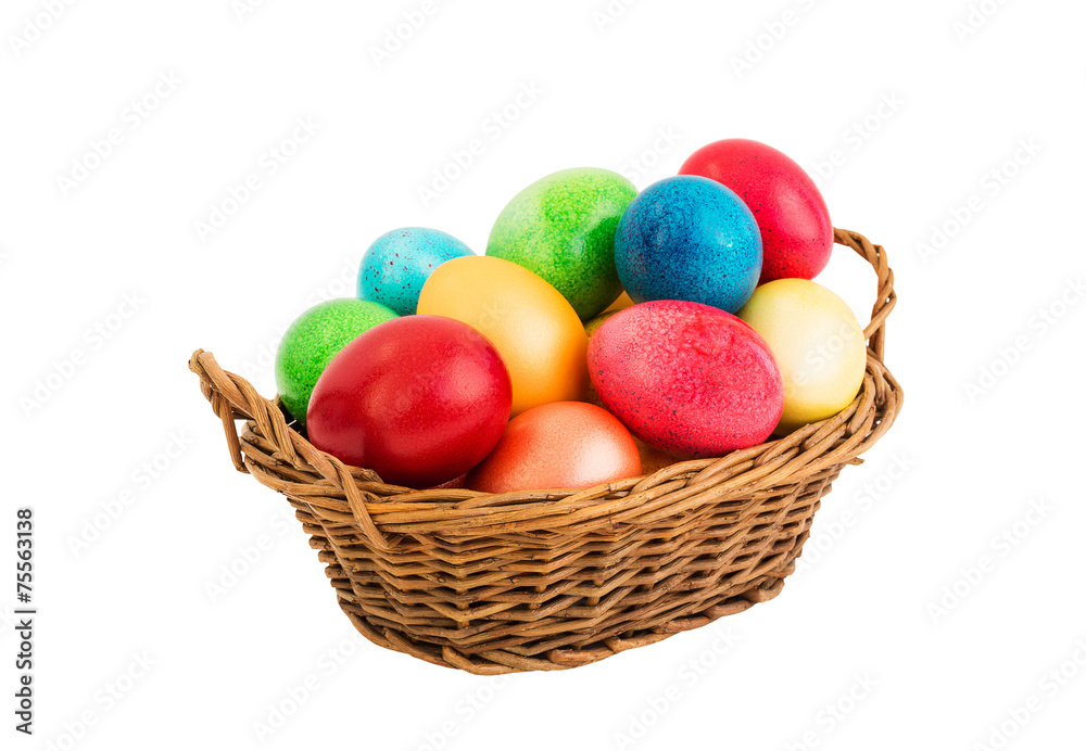 Colorful Easter eggs in basket Colorful Easter eggs in basket