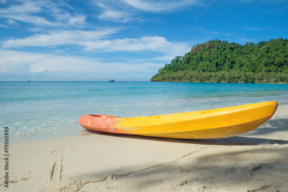 Colorful kayaks on the tropical beach Colorful kayaks on the tropical beach