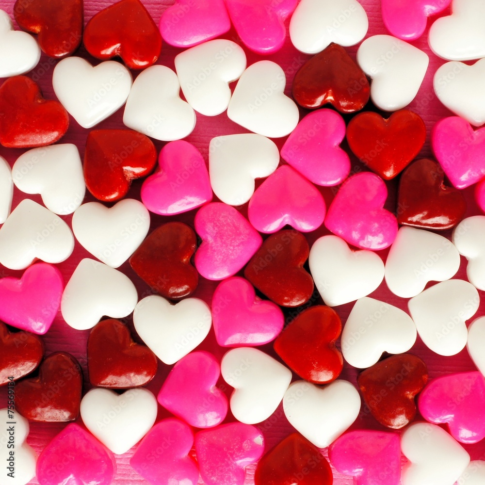 Valentines Day background of pink white and red candies Valentines Day background of pink white and red candies