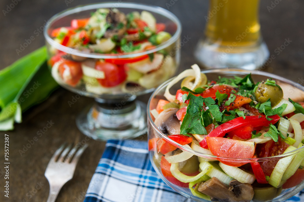 Italian salad with cherry tomatoes, mushrooms, sweet peppers and