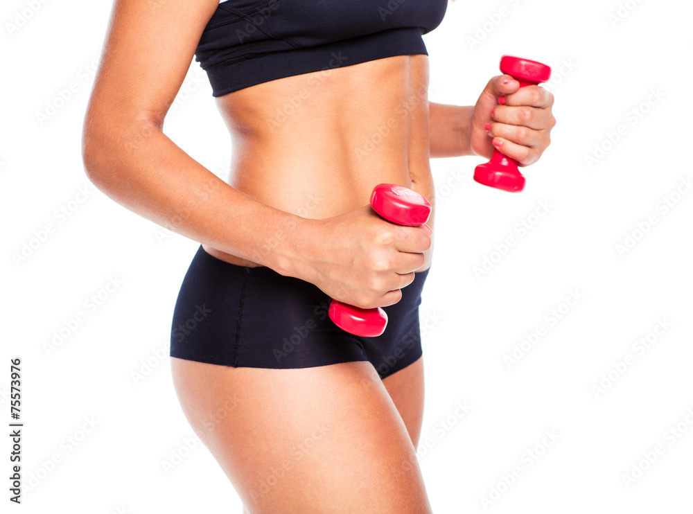 Beautiful slim woman with dumbbells, isolated on white Beautiful slim woman with dumbbells, isolated on white