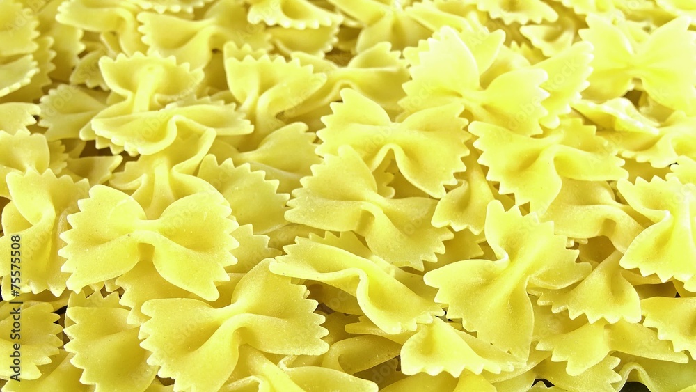 Uncooked Bow-Tie Pasta (not loopable 4K UHD footage) Uncooked Bow-Tie Pasta (not loopable 4K UHD footage)