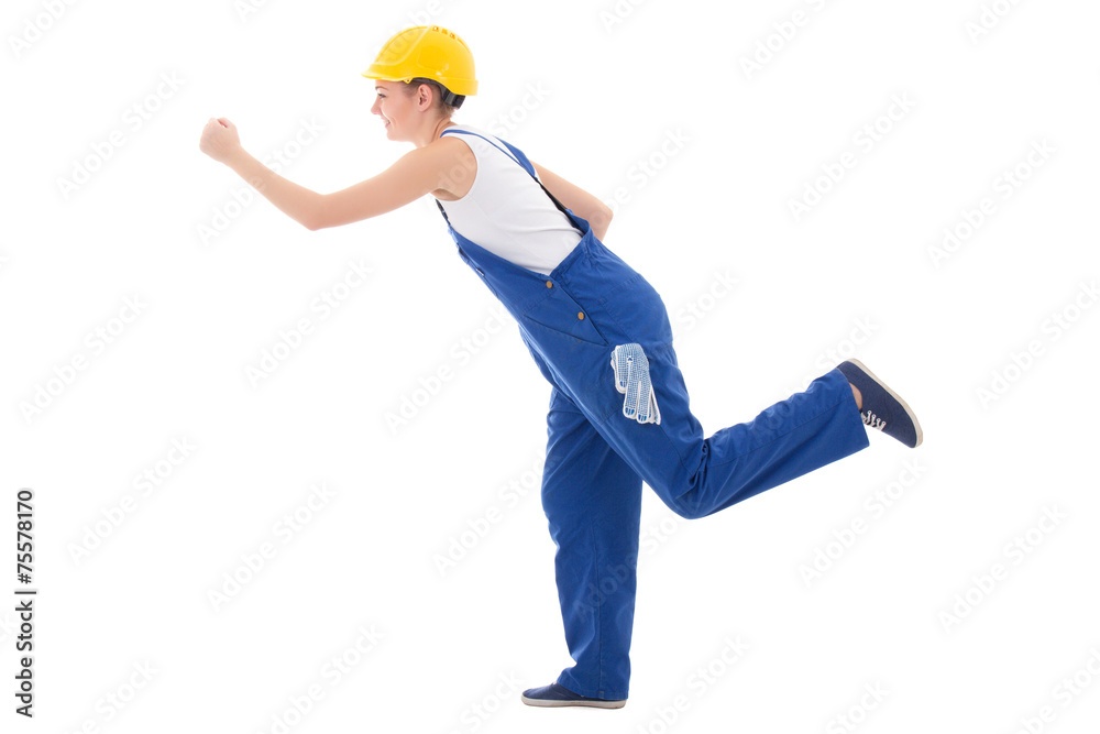career concept - happy woman builder in blue coveralls running i career concept - happy woman builder in blue coveralls running i
