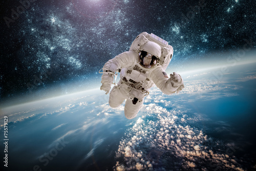 Astronaut outer spac Elements of this image furnished by NASA. #75579129