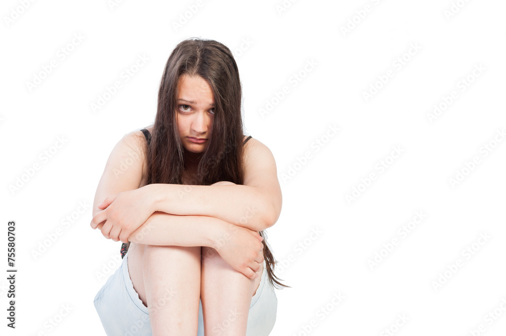 Fototapeta premium Upset teen girl with sad face