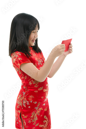 Beautiful asian girl holding ang pow or red packet monetary gift