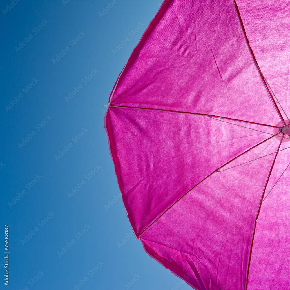 beach umrella with blue sky