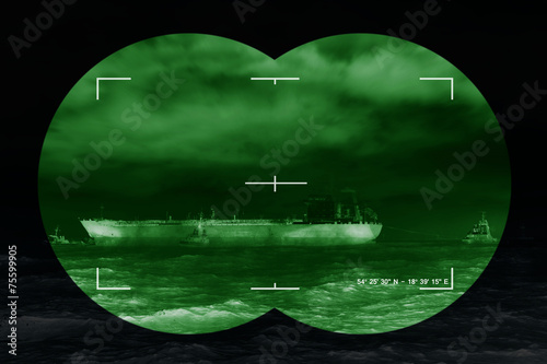 Obraz na płótnie Sea freight and contemporary threat of terrorism - Concept Photo w salonie