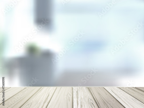 wooden desk over blurred interior scene