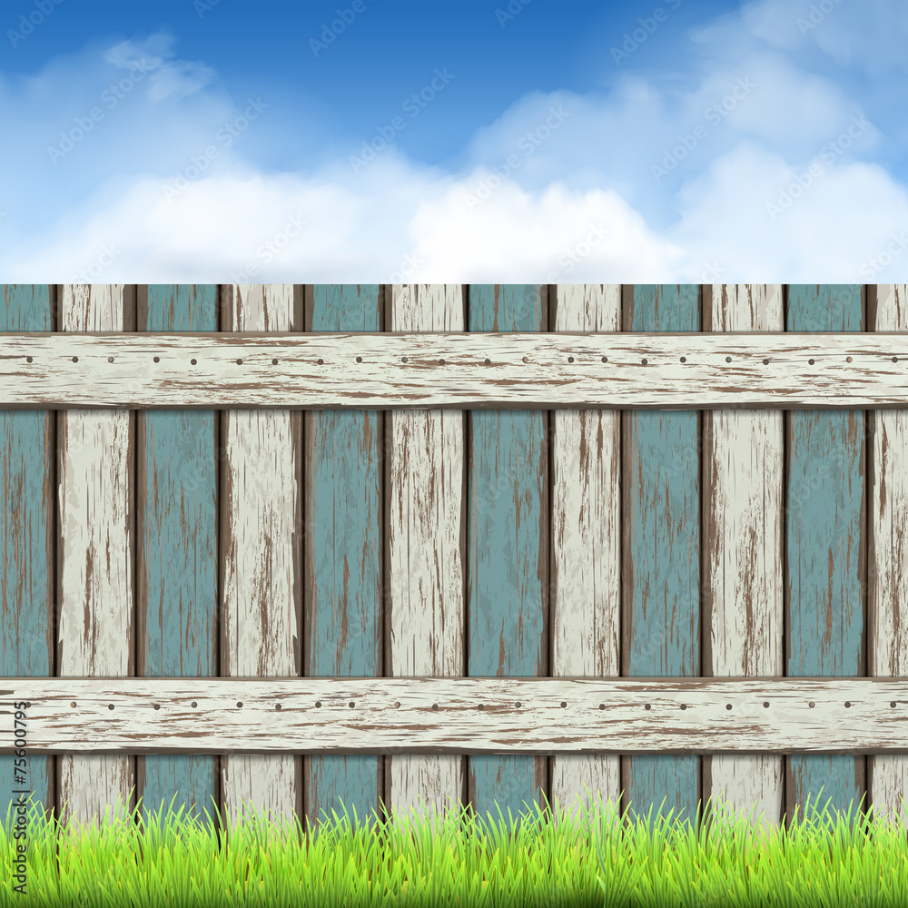 wooden fence with green grass and blue sky wooden fence with green grass and blue sky