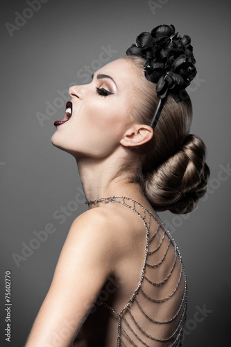 fashion model topless, chains, makeup, hairstyle, black flower