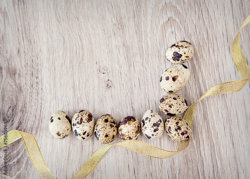 Easter eggs with place for your text on the wooden background Easter eggs with place for your text on the wooden background