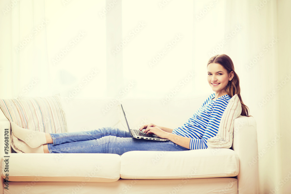 smiling teenage girl with laptop computer at home smiling teenage girl with laptop computer at home