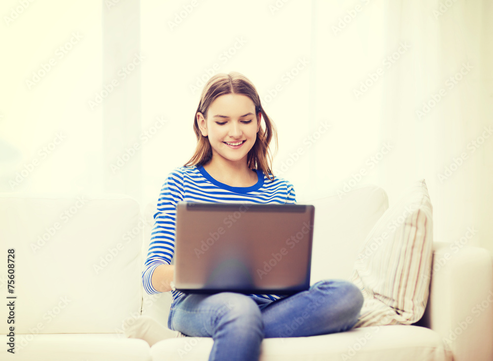 smiling teenage girl with laptop computer at home smiling teenage girl with laptop computer at home