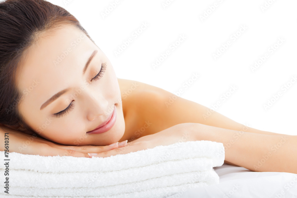 Young  woman getting spa treatment over white background