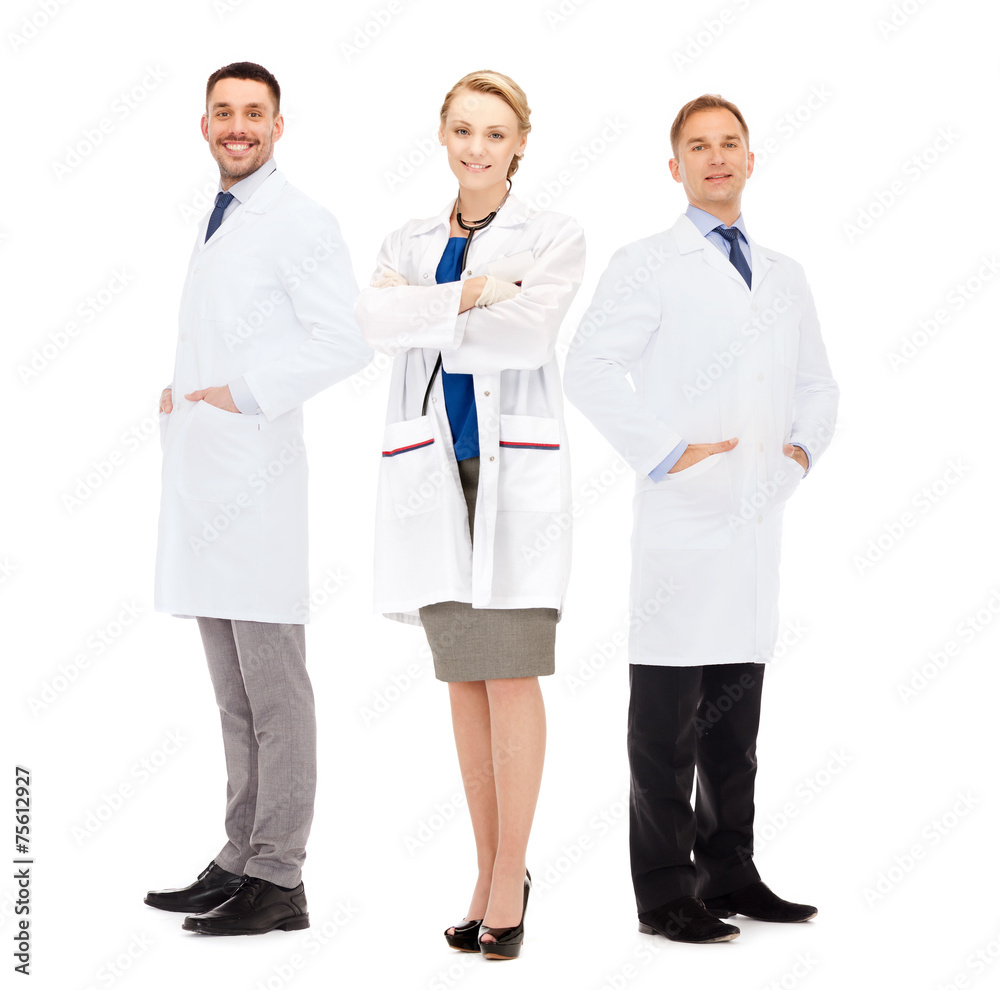 group of smiling doctors in white coats