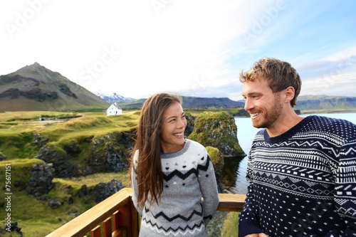 Tourist couple on romantic travel on Iceland photo