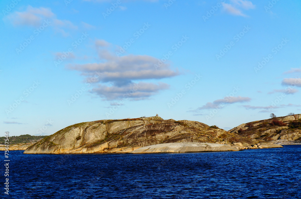 Rocky island in Fjord