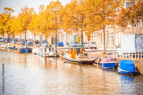 Canvas Print Canal in Amsterdam during the autum
