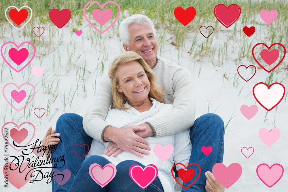Composite image of romantic senior couple relaxing at beach Composite image of romantic senior couple relaxing at beach