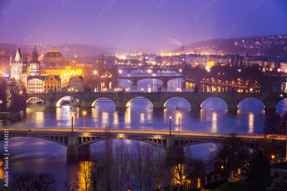 Obraz premium Vltava (Moldau) River at Prague with Charles Bridge at dusk, Cze
