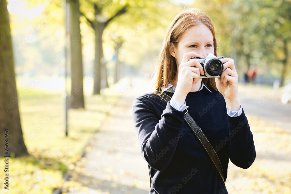 Amateur Photographer in a City Park