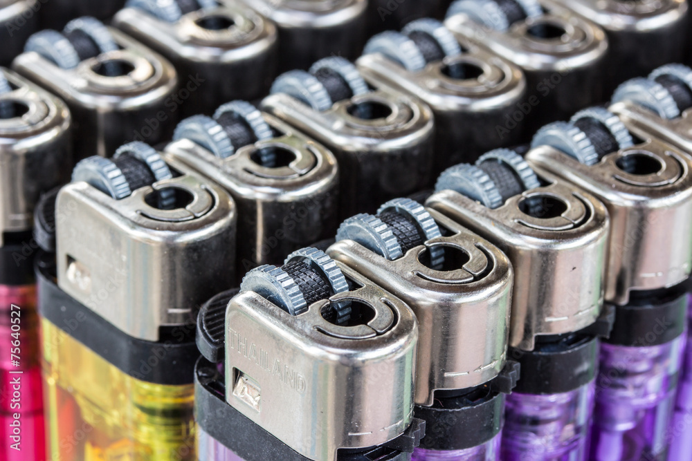 Close up image of a selection of cigarette lighters Close up image of a selection of cigarette lighters