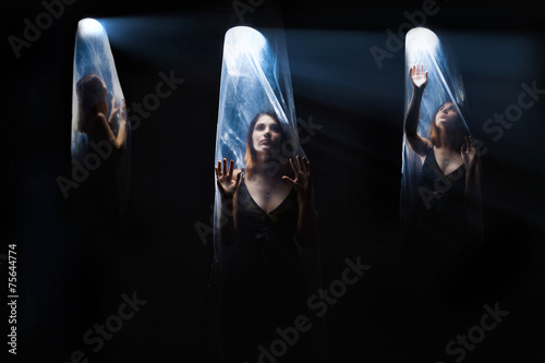 Tableau sur toile agoraphobia 3 girls woman inside a plastic bag,  bright light