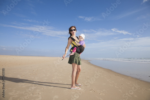Photography miniskirt mom with baby in rucksack