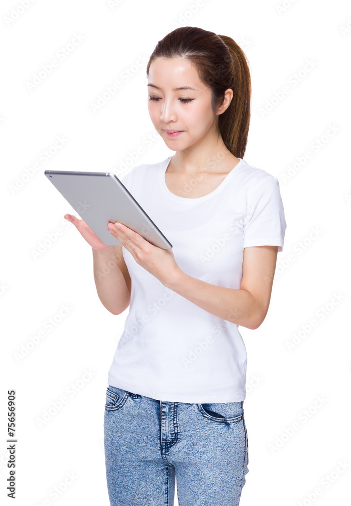 Woman look at tablet Woman look at tablet