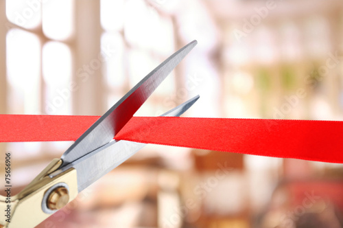 Grand opening, cutting red ribbon