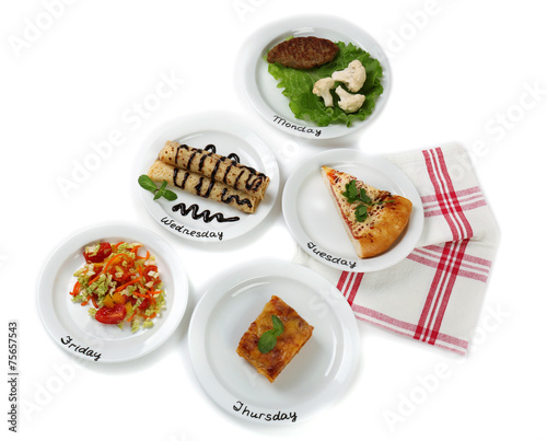 Daily menu. Plates with food on table