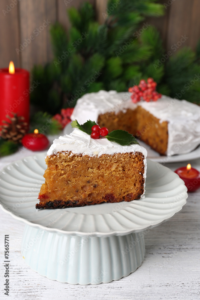 Slice of cake covered cream with Christmas decoration Slice of cake covered cream with Christmas decoration