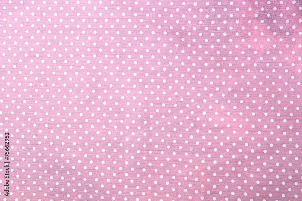 pink polka dot fabric closeup. May use as background pink polka dot fabric closeup. May use as background