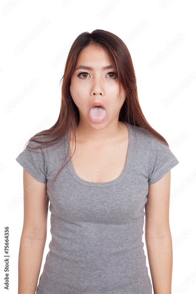 Funny young Asian woman sticking out tongue Funny young Asian woman sticking out tongue