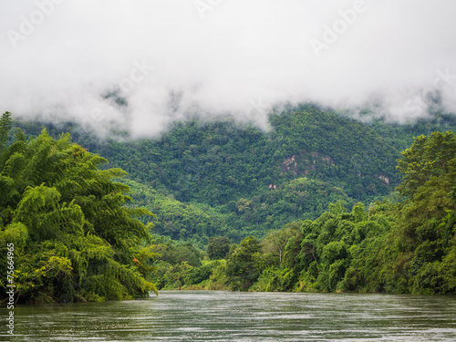 Nature landscape of river and mist over mountain