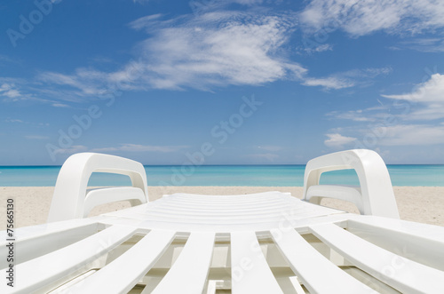 deckchair on a beach, seashore © Nicodape